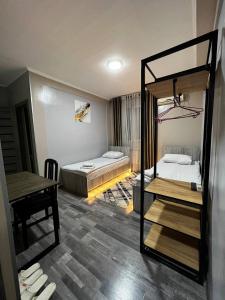 Postel nebo postele na pokoji v ubytování Ave hotel