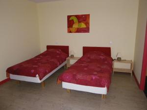Postel nebo postele na pokoji v ubytování Gîte l'Ermitage Thiaucourt