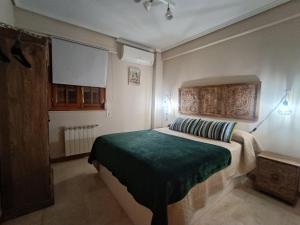 Posteľ alebo postele v izbe v ubytovaní Varone