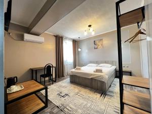 Postel nebo postele na pokoji v ubytování Ave hotel