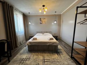 Postel nebo postele na pokoji v ubytování Ave hotel