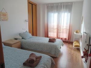 Postel nebo postele na pokoji v ubytování Dúplex El refugio de Porma