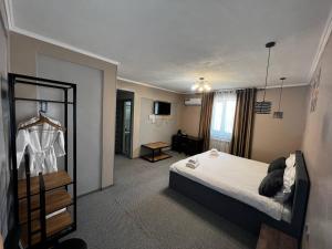 Postel nebo postele na pokoji v ubytování Ave hotel