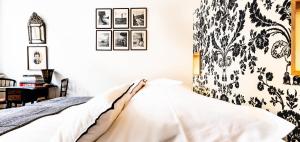 Postel nebo postele na pokoji v ubytování Maison Amodio Boutique B&B adults only