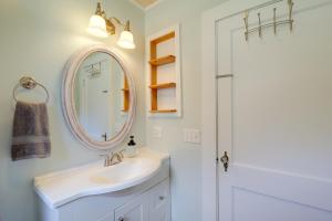 a bathroom with a sink and a mirror at Idyllic Blue Ridge Mountain Home on 26-Acre Farm in Roan Mountain +29 photos