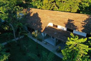 an overhead view of a house with a roof at Kintana Hotel SPA in Dzamandzar