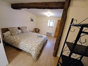 Posteľ alebo postele v izbe v ubytovaní Pechingorp Chambres d'hôtes