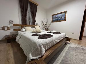 Posteľ alebo postele v izbe v ubytovaní Rustic Lodge Plitvice