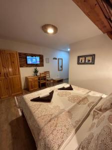 Posteľ alebo postele v izbe v ubytovaní Rustic Lodge Plitvice