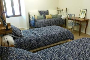Posteľ alebo postele v izbe v ubytovaní Pechingorp Chambres d'hôtes