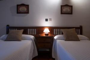 A bed or beds in a room at Posada La Olma