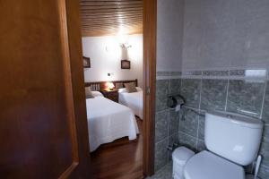 A bed or beds in a room at Posada La Olma