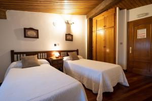 A bed or beds in a room at Posada La Olma