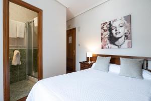 A bed or beds in a room at Posada La Olma