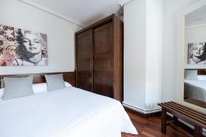 A bed or beds in a room at Posada La Olma