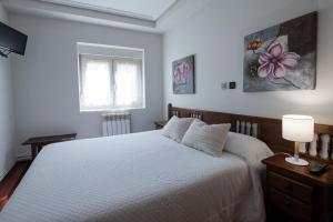 A bed or beds in a room at Posada La Olma