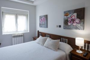 A bed or beds in a room at Posada La Olma