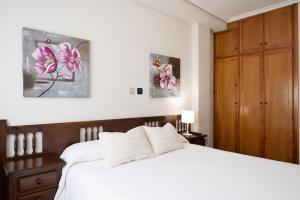 A bed or beds in a room at Posada La Olma