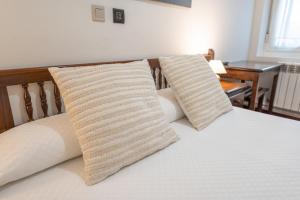 A bed or beds in a room at Posada La Olma