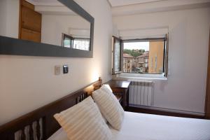 A bed or beds in a room at Posada La Olma