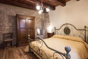 Postel nebo postele na pokoji v ubytování Domus in Castro