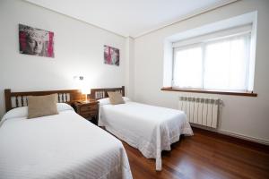 A bed or beds in a room at Posada La Olma