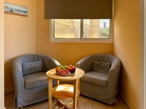 Posedenie v ubytovaní 1 Schlafzimmer Ferienwohnung am Strand