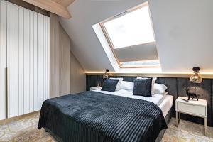 Aparthotel Diamond SPA Aqua客房内的一张或多张床位