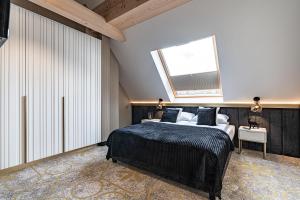 Aparthotel Diamond SPA Aqua客房内的一张或多张床位
