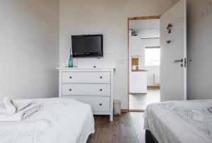 Postel nebo postele na pokoji v ubytování Blue House B&B