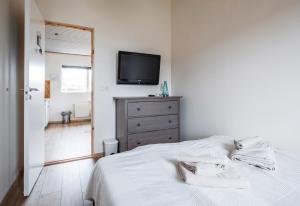 Postel nebo postele na pokoji v ubytování Blue House B&B