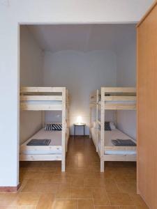Postel nebo postele na pokoji v ubytování Can Talena Turisme