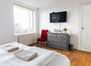 Postel nebo postele na pokoji v ubytování Blue House B&B