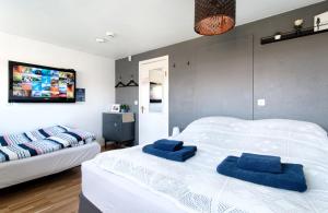 Postel nebo postele na pokoji v ubytování Blue House B&B