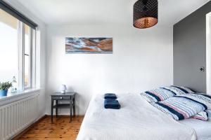 Postel nebo postele na pokoji v ubytování Blue House B&B