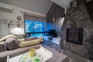 Khu vực ghế ngồi tại Villa Alppihimos - 6 henkilölle, Keski-Himos, 45m² + 33m²