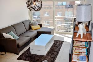 Ruang duduk di Lumina Suite Seaview & Garage