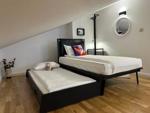 a bedroom with two beds in a room at Sana Ski apartment 702 in Flora, Borovets in Borovets