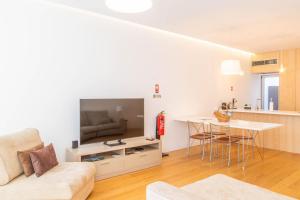 Et tv og/eller underholdning på Forno da Cal Sea House