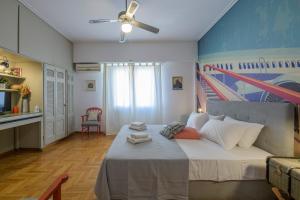 Llit o llits en una habitació de Syntagma Urban Oasis