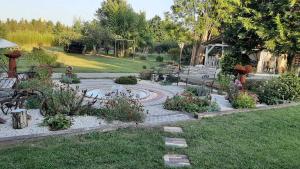A garden outside HARTMANN PANZIÓ