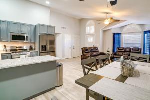 a kitchen and living room with a table and chairs at Pet-Friendly El Paso Retreat 20 Mi to Downtown! in El Paso