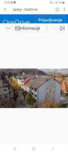 a picture of a building with a mural on it at Apartments Gorska in Kolašin
