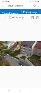 a screenshot of a website with a picture of a building at Apartments Gorska in Kolašin