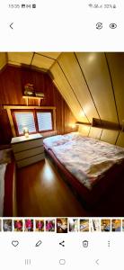 a small bedroom with a bed in a boat at Chalúpka Sokolí dvor in Terchová