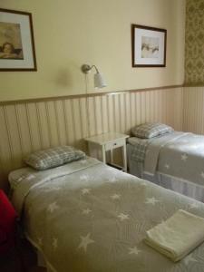 Postel nebo postele na pokoji v ubytování B&B Savikon Kartano