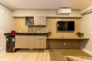 Apartamentos Studio Allure Moema - Com café da manhã opcional, Recepção e Valet 24 horas的厨房或小厨房