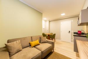 Apartamentos Studio Allure Moema - Com café da manhã opcional, Recepção e Valet 24 horas的休息区