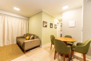 Apartamentos Studio Allure Moema - Com café da manhã opcional, Recepção e Valet 24 horas的休息区