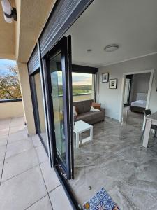 a living room with a couch and a table at Valpino 